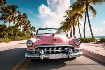 Vintage Pink Convertible Car On Tropical Coastal Road