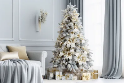 Elegant Christmas Tree Decorated With Gold Flowers And Lights
