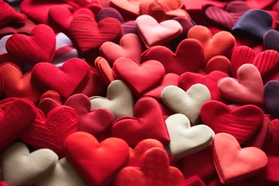 Pile of Red and Beige Fabric Hearts