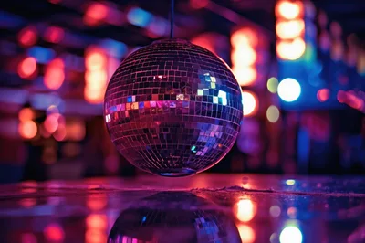 Reflective Disco Ball Hanging In A Nightclub