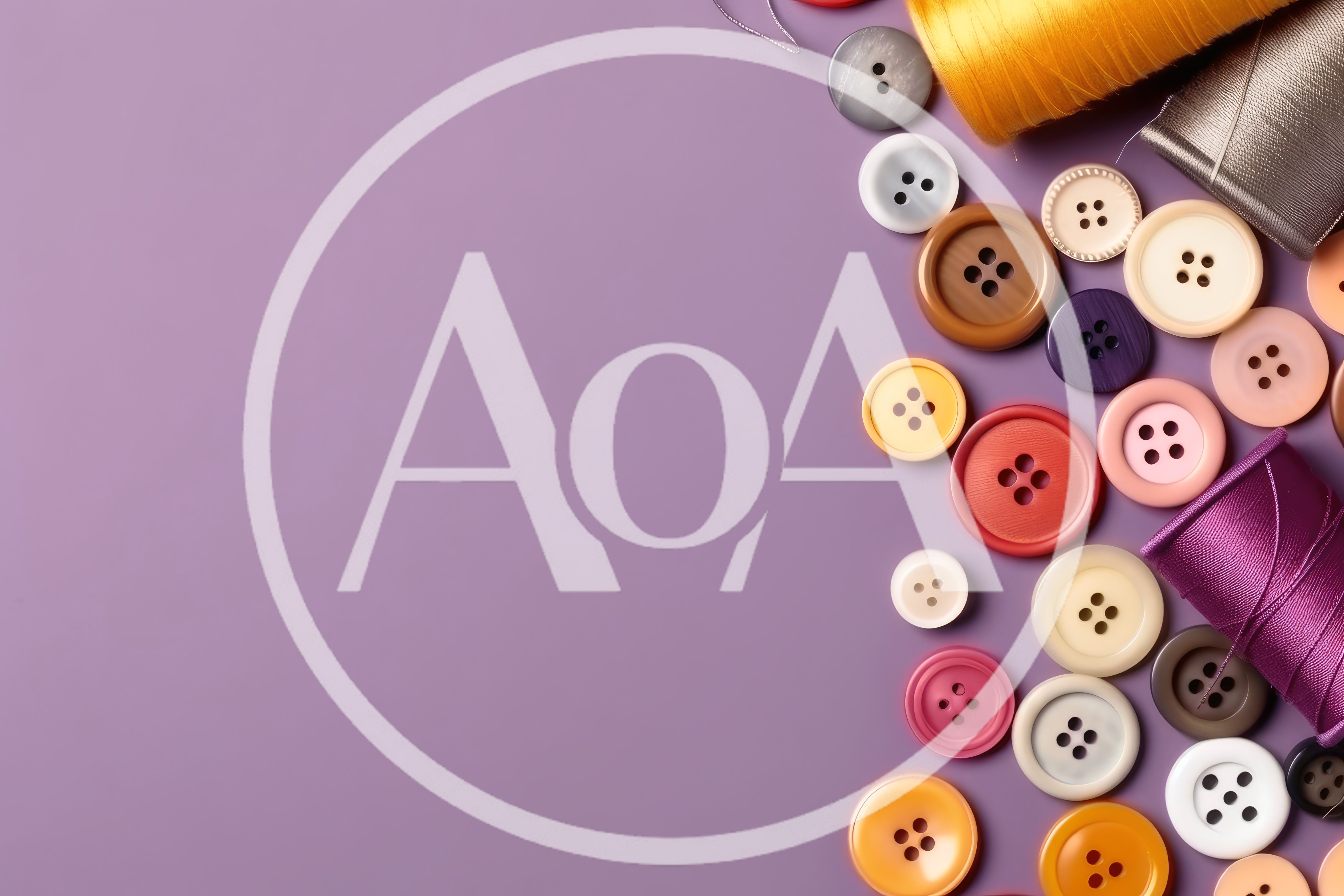 Assorted Sewing Buttons and Thread Spools on Purple Background