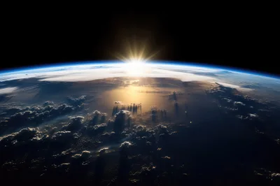 Sunrise Over Earth Horizon From Space