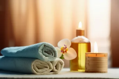 Spa Relaxation Setting with Towels and Candles