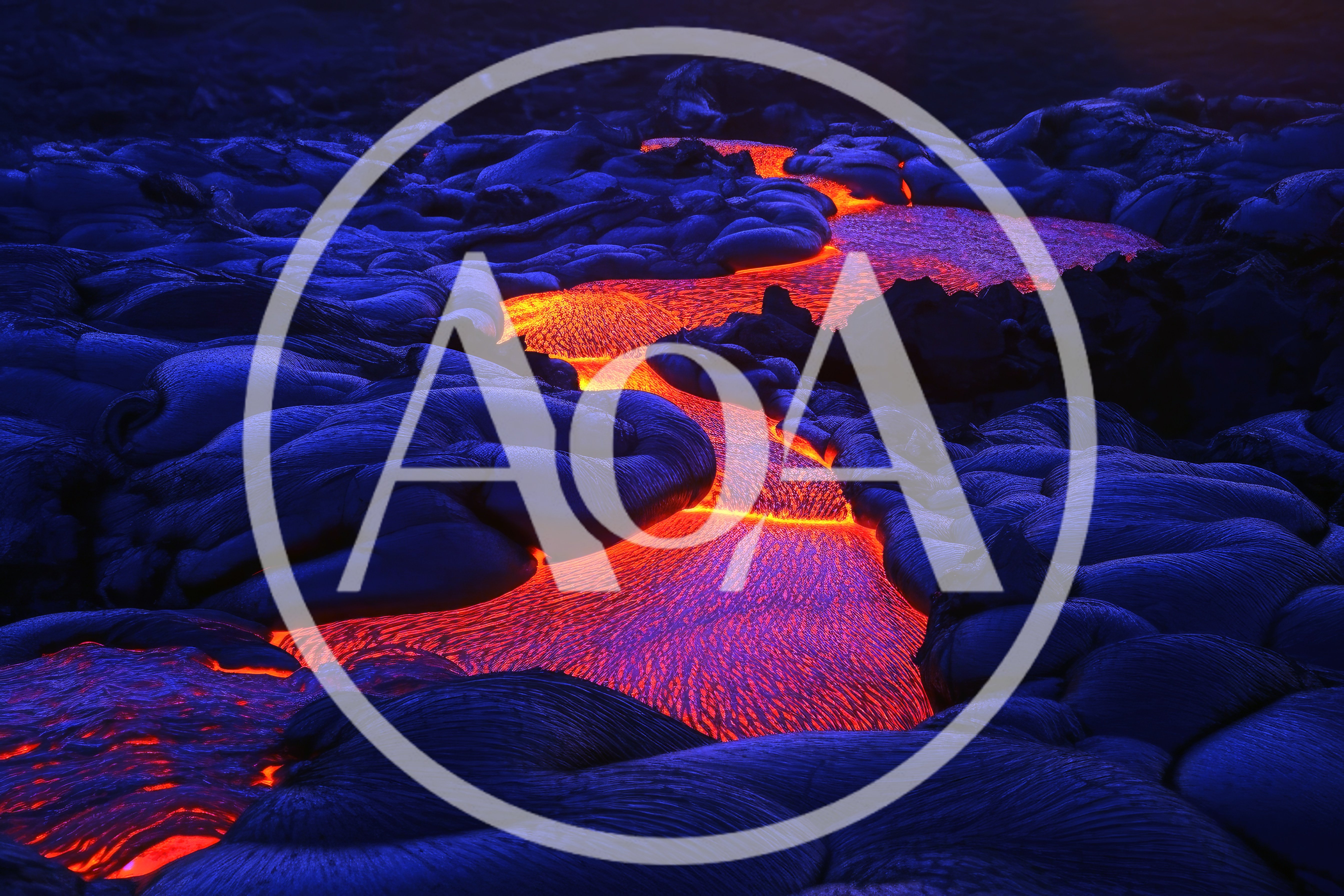 Molten Lava Flowing Over Volcanic Rock