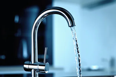 Chrome Kitchen Faucet With Running Water Stream
