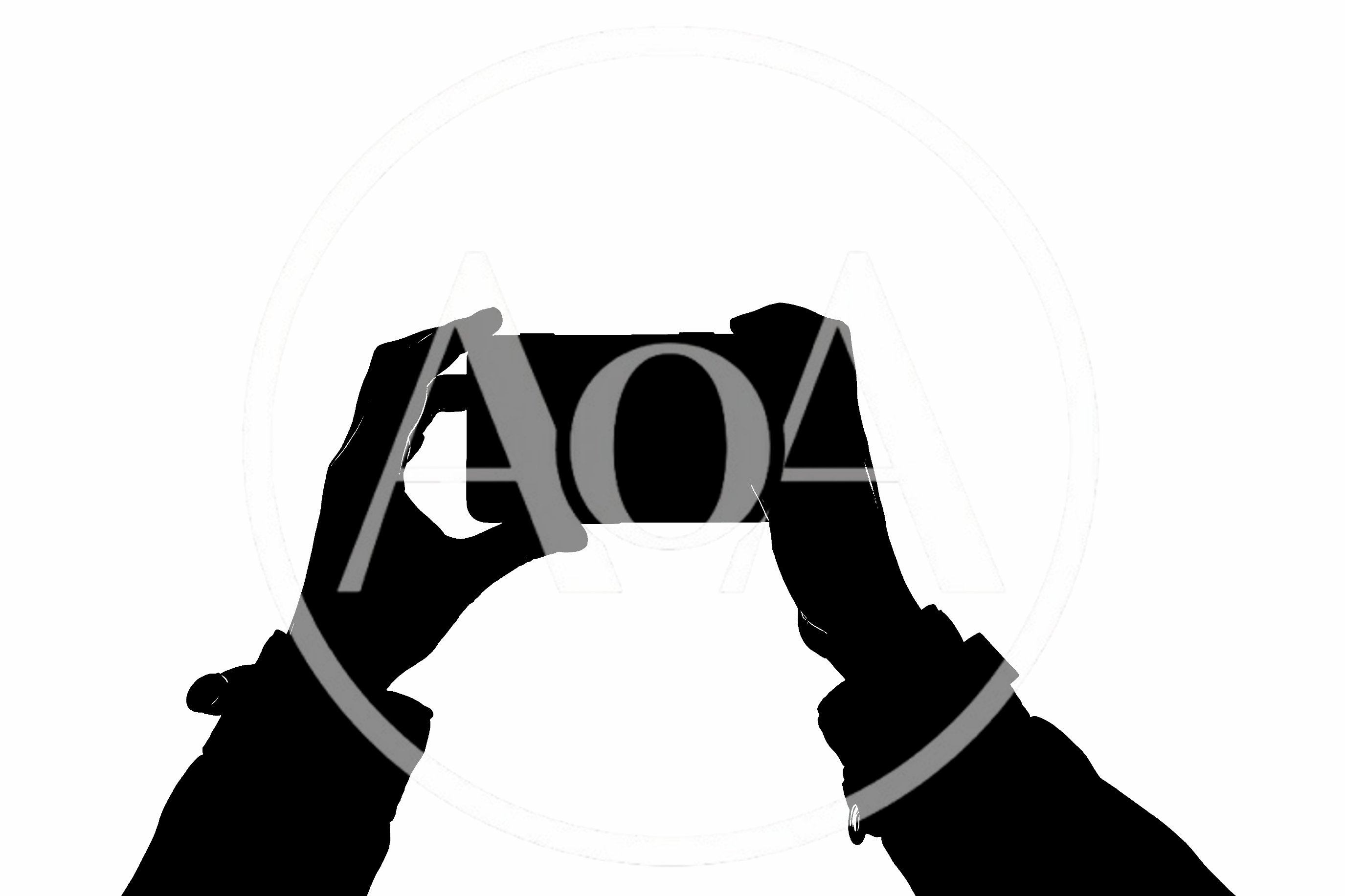 Silhouette Of Hands Holding A Smartphone