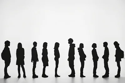 Silhouettes Of Students Standing In A Line