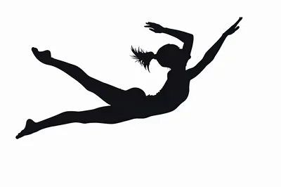 Silhouette Of A Female Gymnast Performing A Leap