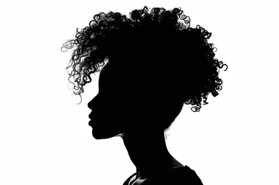 Silhouette Profile Of A Woman With Curly Hair