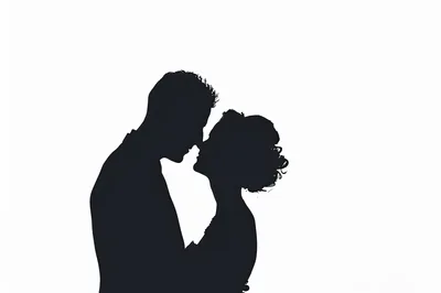 Silhouette Of A Romantic Couple About To Kiss