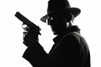 Silhouette Of A Detective Holding A Handgun