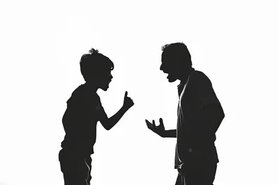 Silhouette Of A Father And Son Arguing