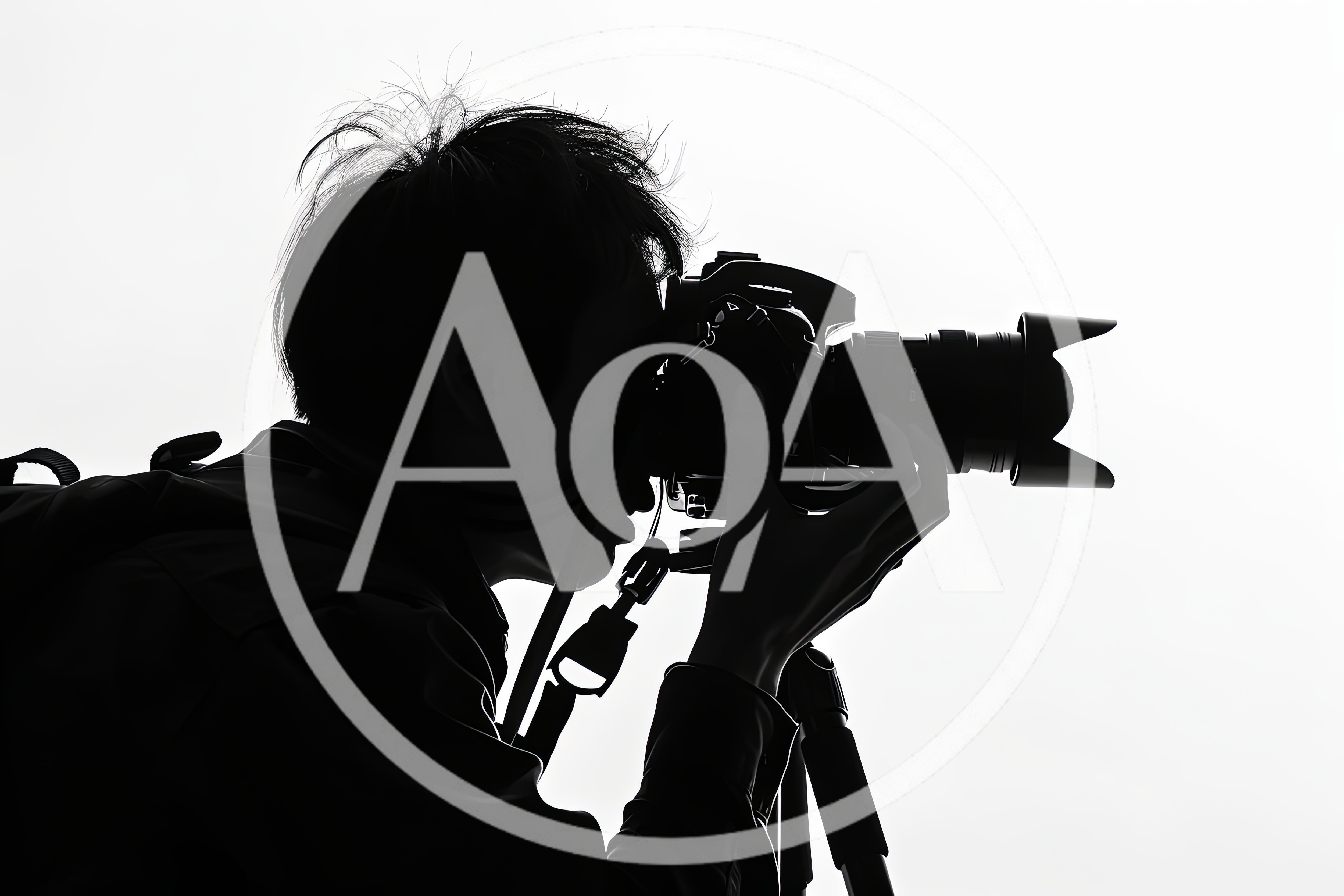 Silhouette Of A Photographer Using A Camera On Tripod