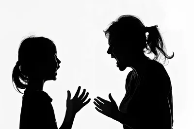 Silhouette Of A Mother And Daughter Arguing