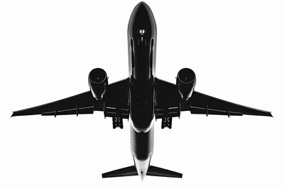 Commercial Airplane Silhouette Flying Overhead