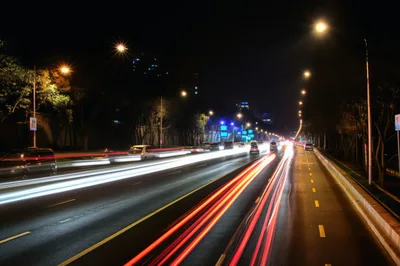 Night Traffic Light Trails On Urban Highway