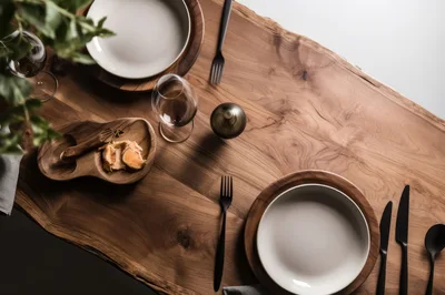Elegant Table Setting On A Live Edge Wooden Table