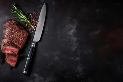 Sliced Grilled Beef Steak with Rosemary and Peppercorns