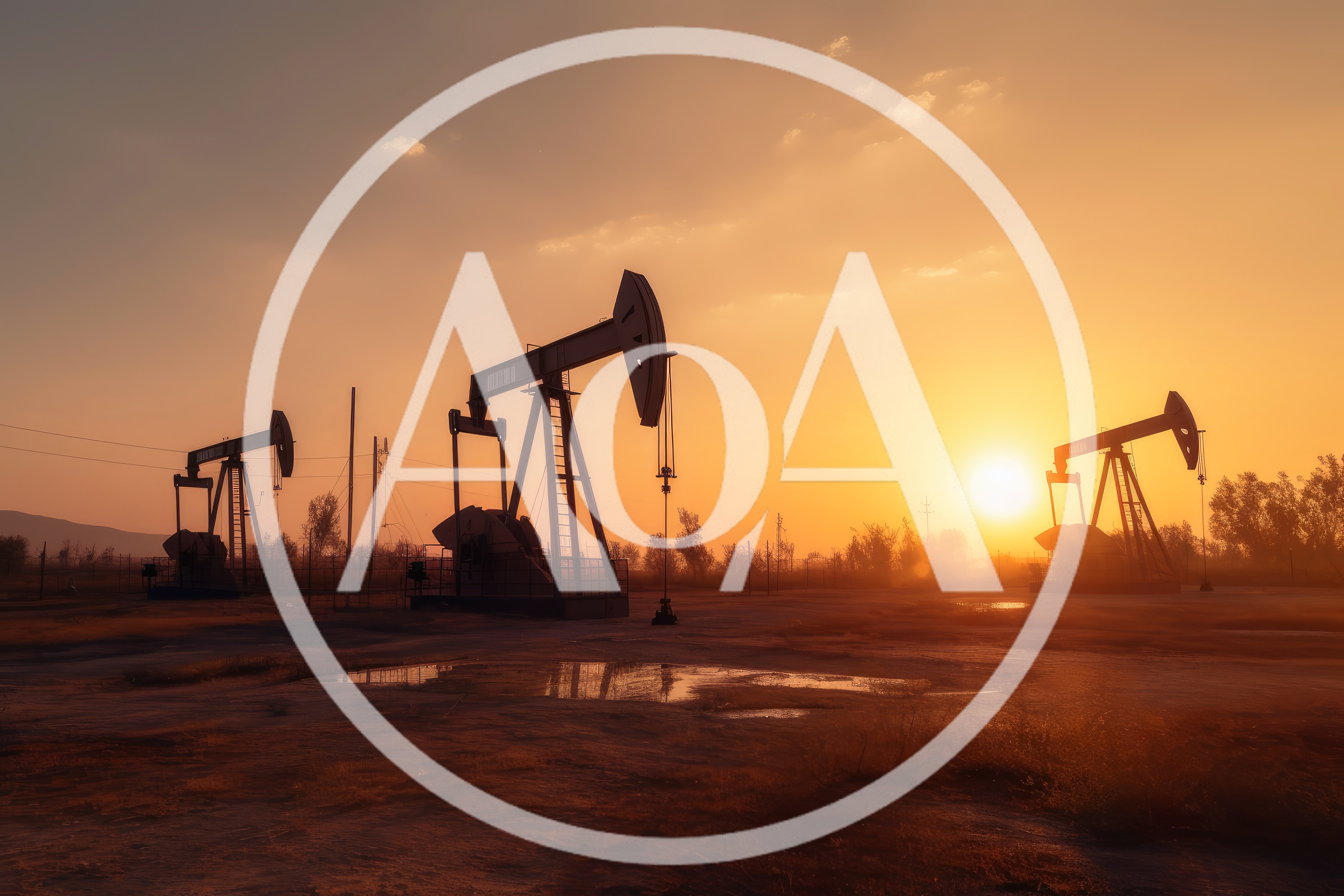 Oil Pump Jacks Operating During A Golden Sunset