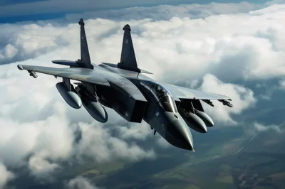 F-15 Eagle Fighter Jet Flying Above Clouds