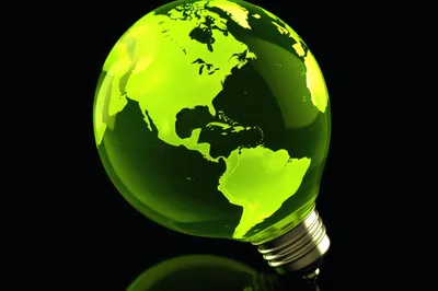 Glowing Green Earth Globe Inside A Light Bulb