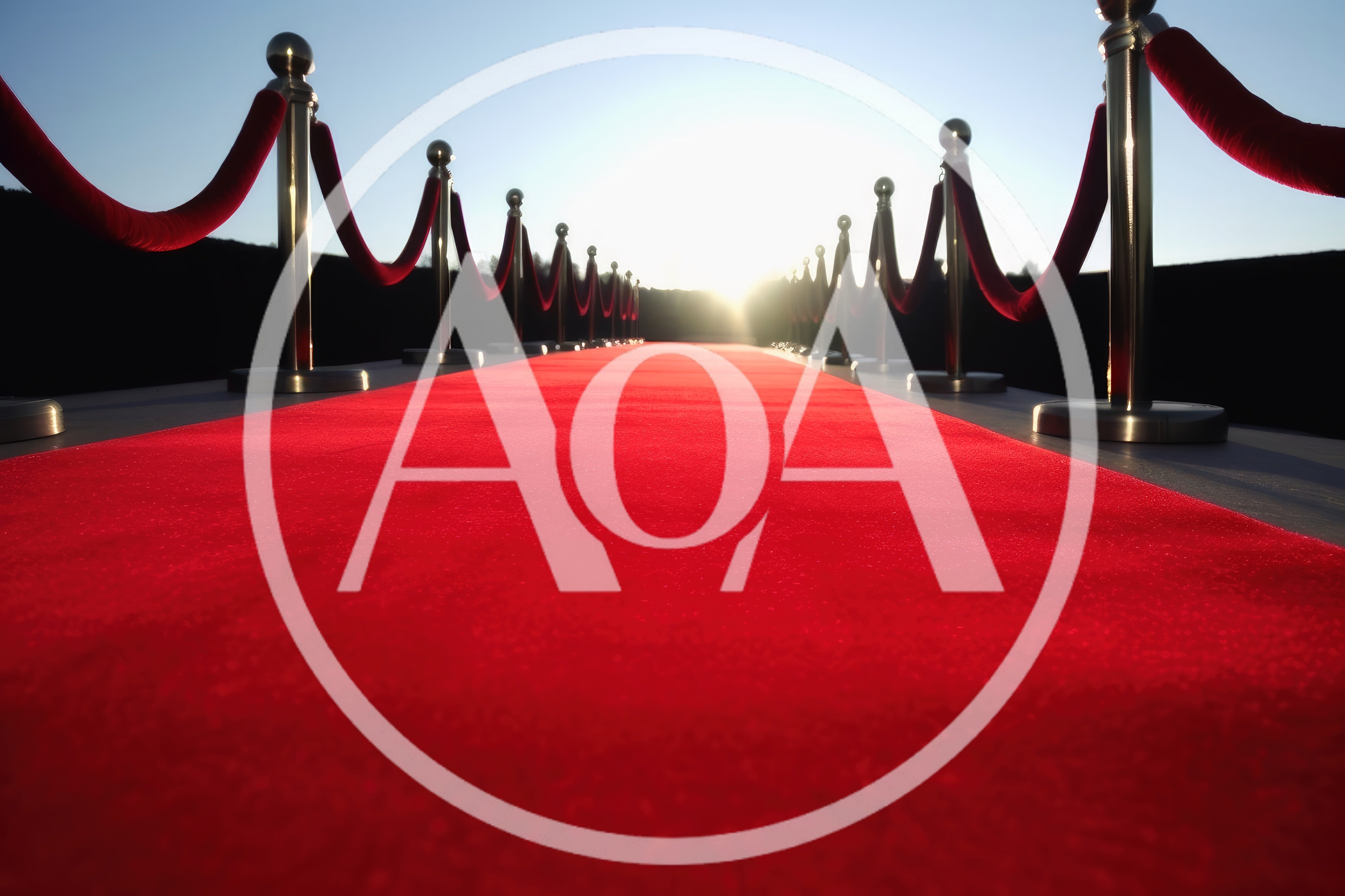 Red Carpet Entrance With Stanchions At Sunset