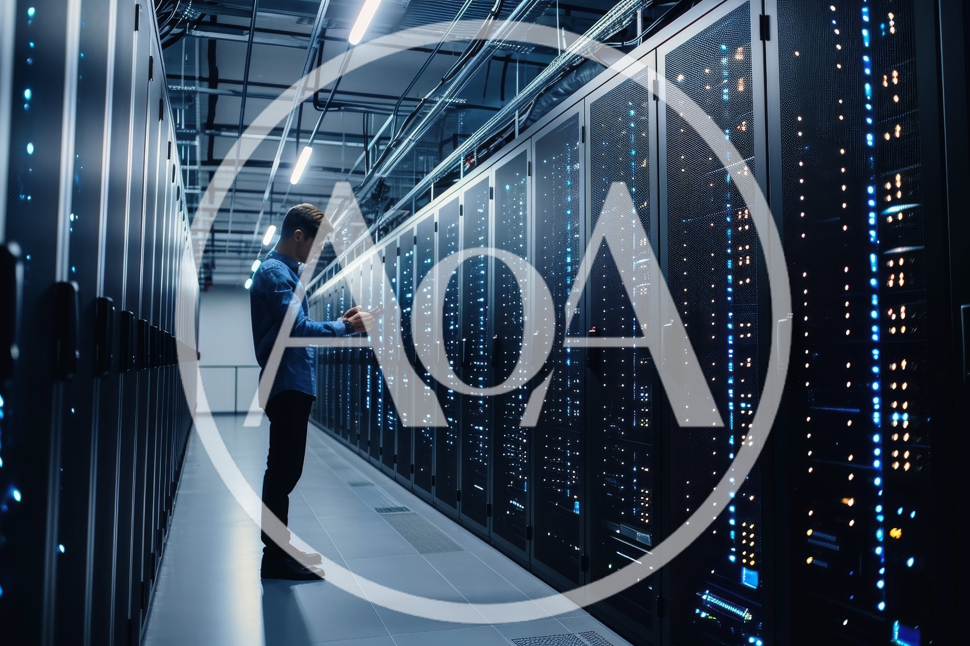 IT Technician Monitoring Server Racks in Data Center