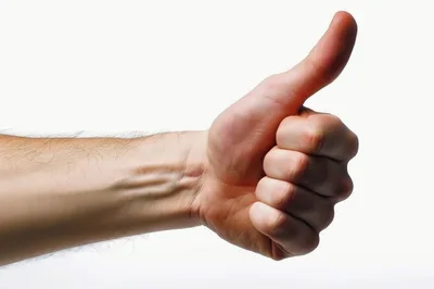 Human Hand Showing Thumbs Up Gesture
