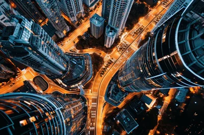 Aerial View Of Modern City Skyscrapers At Night