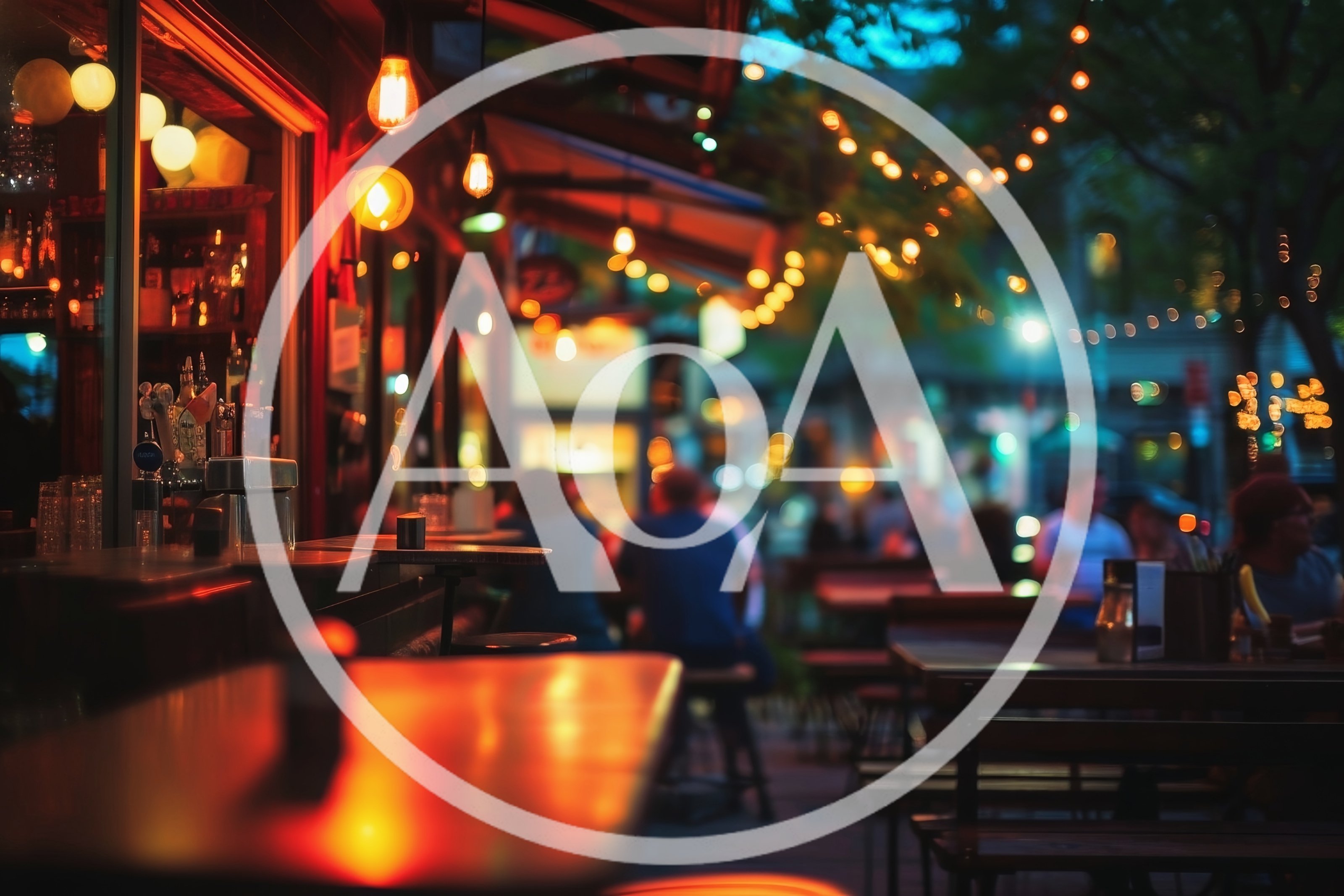 Outdoor Bar Seating At Night With String Lights