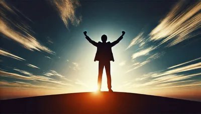 Silhouette Of A Successful Businessman Celebrating On A Hill