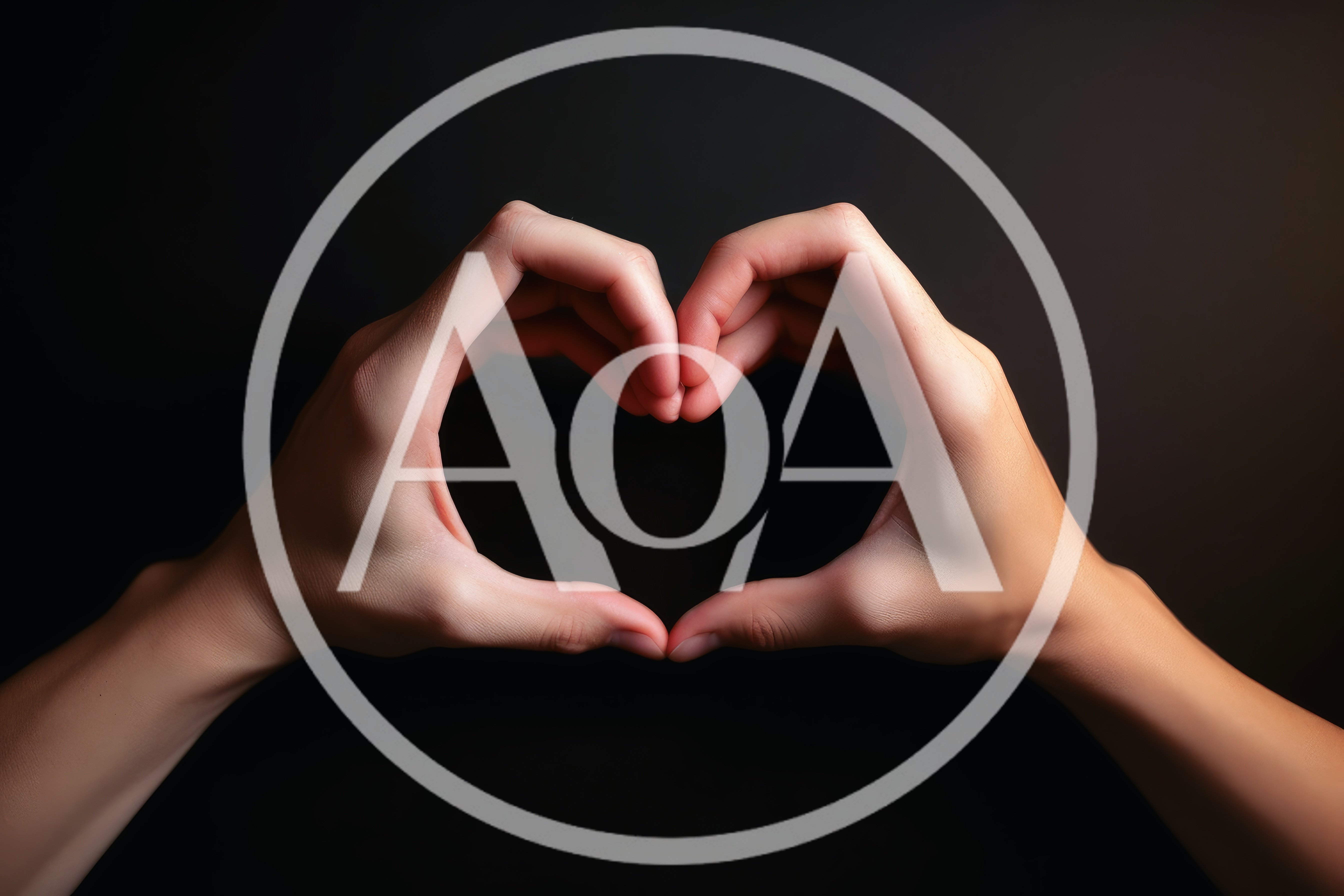 Hands Forming A Heart Shape Against Black Background