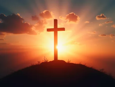 Silhouette Of A Christian Cross On A Hilltop