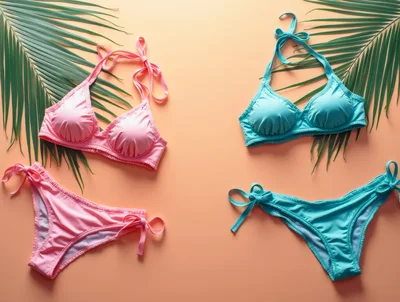 Pink and Blue Bikini Sets on Tropical Background