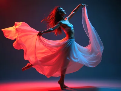 Graceful Female Dancer Performing With Flowing Fabric