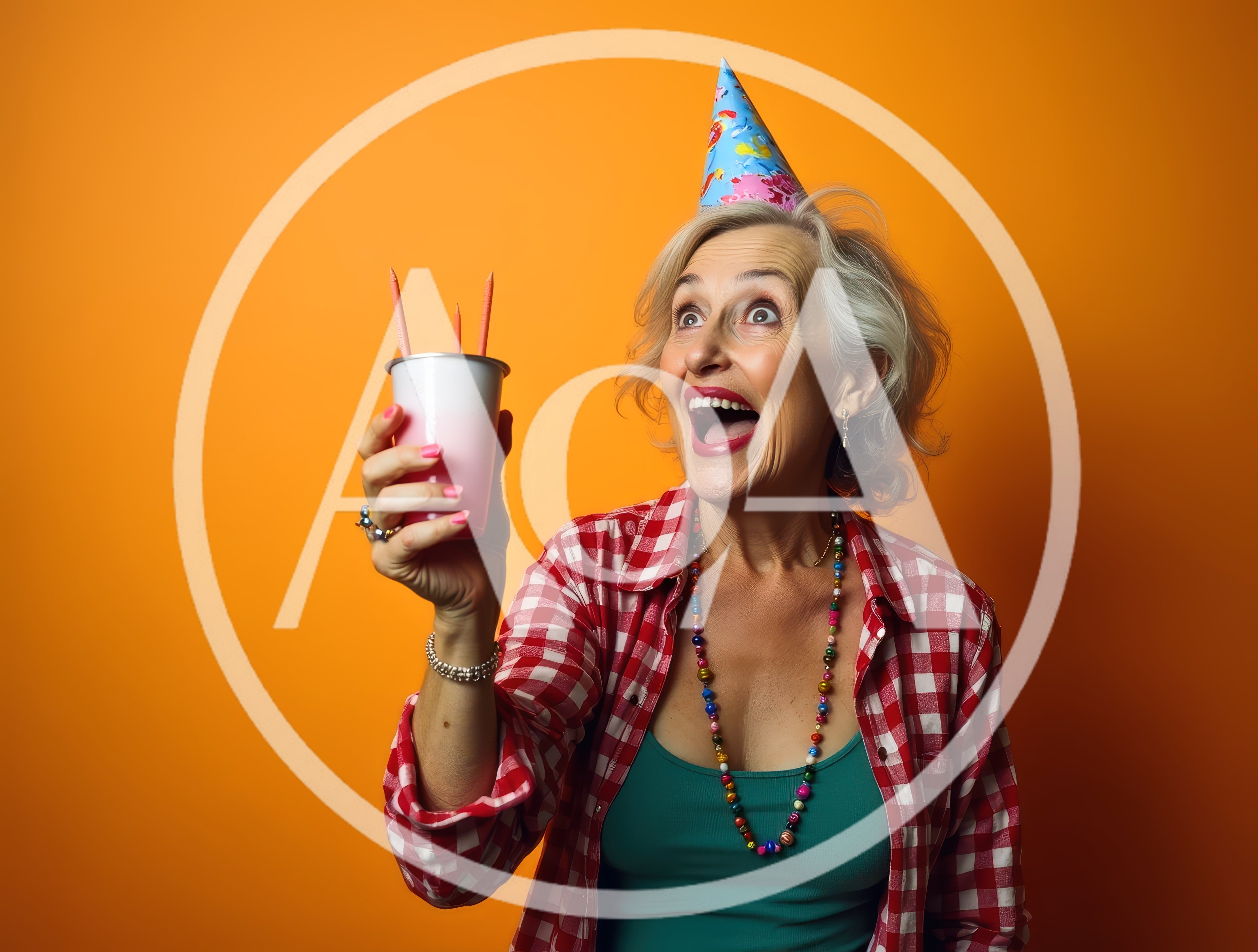 Excited Senior Woman Celebrating With Party Hat And Cup