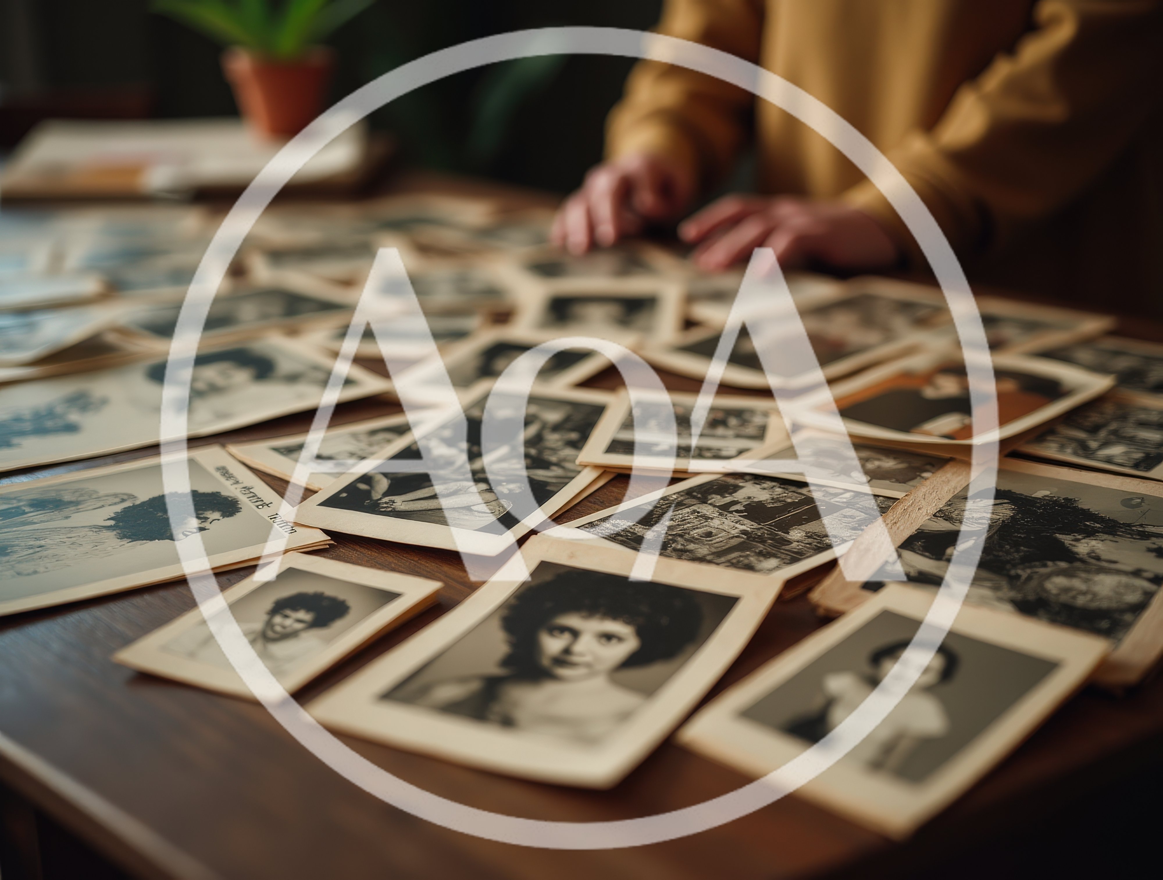 Person Sorting Through Vintage Black And White Photographs