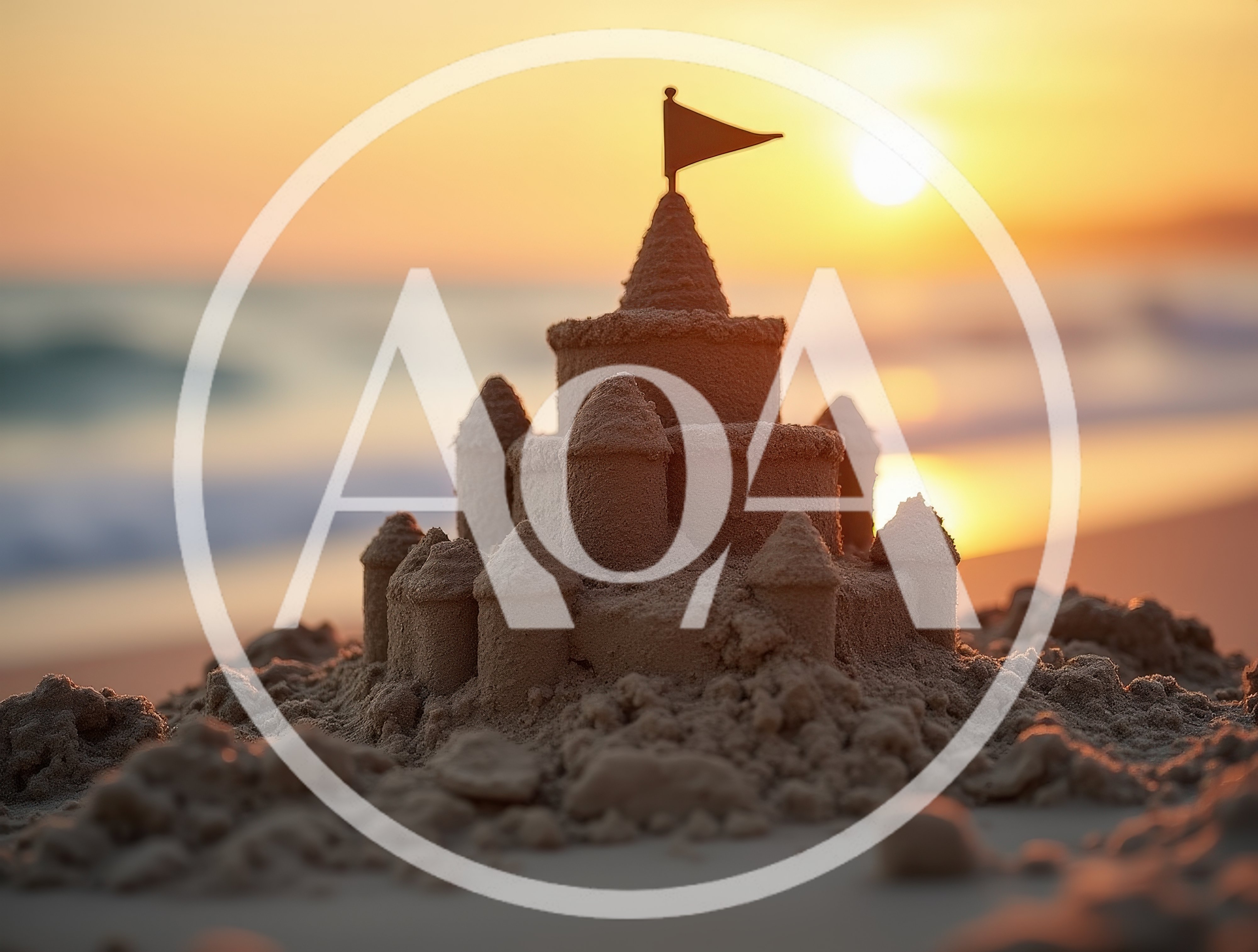 Sandcastle With A Flag On A Beach At Sunset