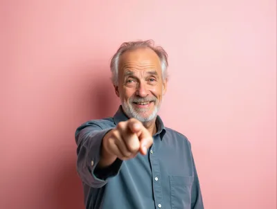 Senior Man Pointing Directly at Camera