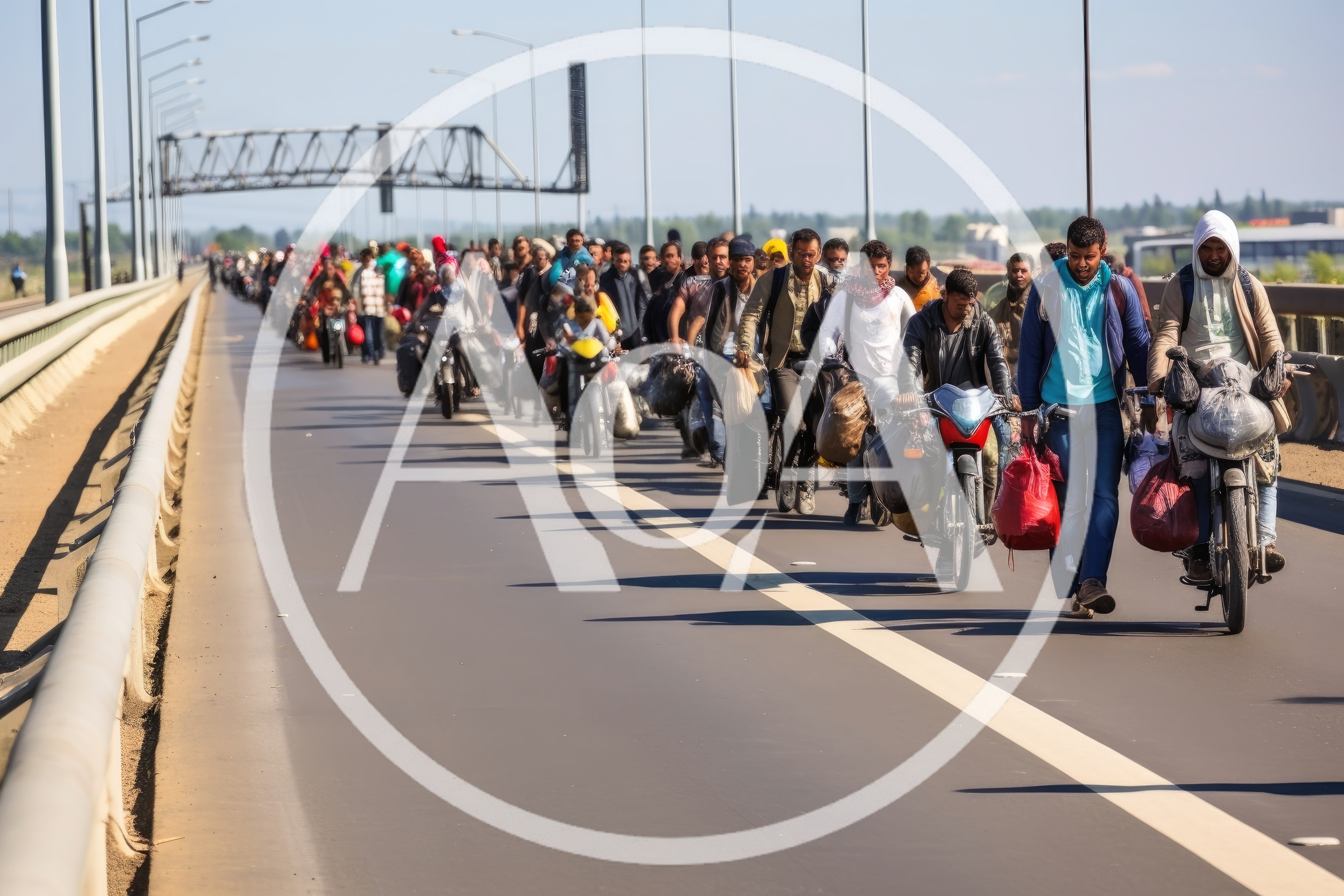Migrants Traveling On Motorcycles Along A Highway Bridge