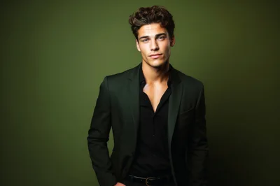 Handsome Young Man In Dark Green Suit Jacket