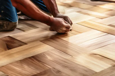 Craftsman Installing Herringbone Pattern Hardwood Flooring