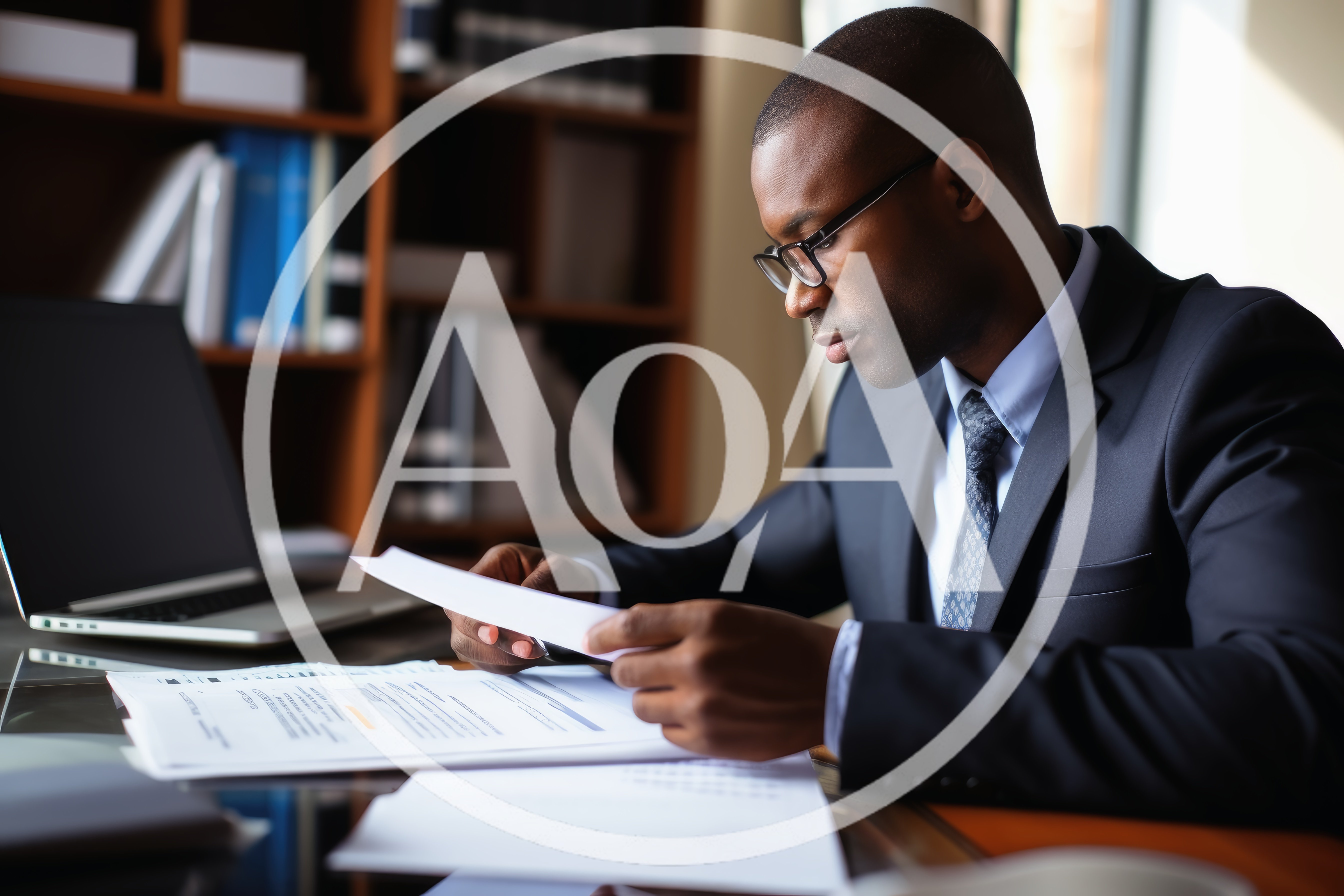 Professional Businessman Reviewing Documents In A Modern Office