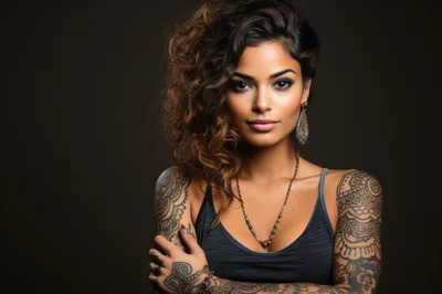 Portrait Of A Beautiful Woman With Intricate Arm Tattoos