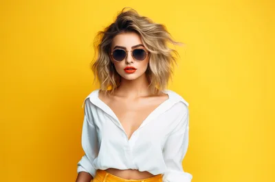 Stylish Young Woman With Blonde Hair Wearing Sunglasses
