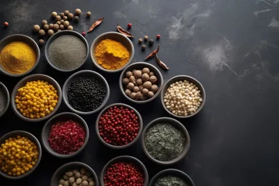 Assorted Spices And Herbs In Small Bowls
