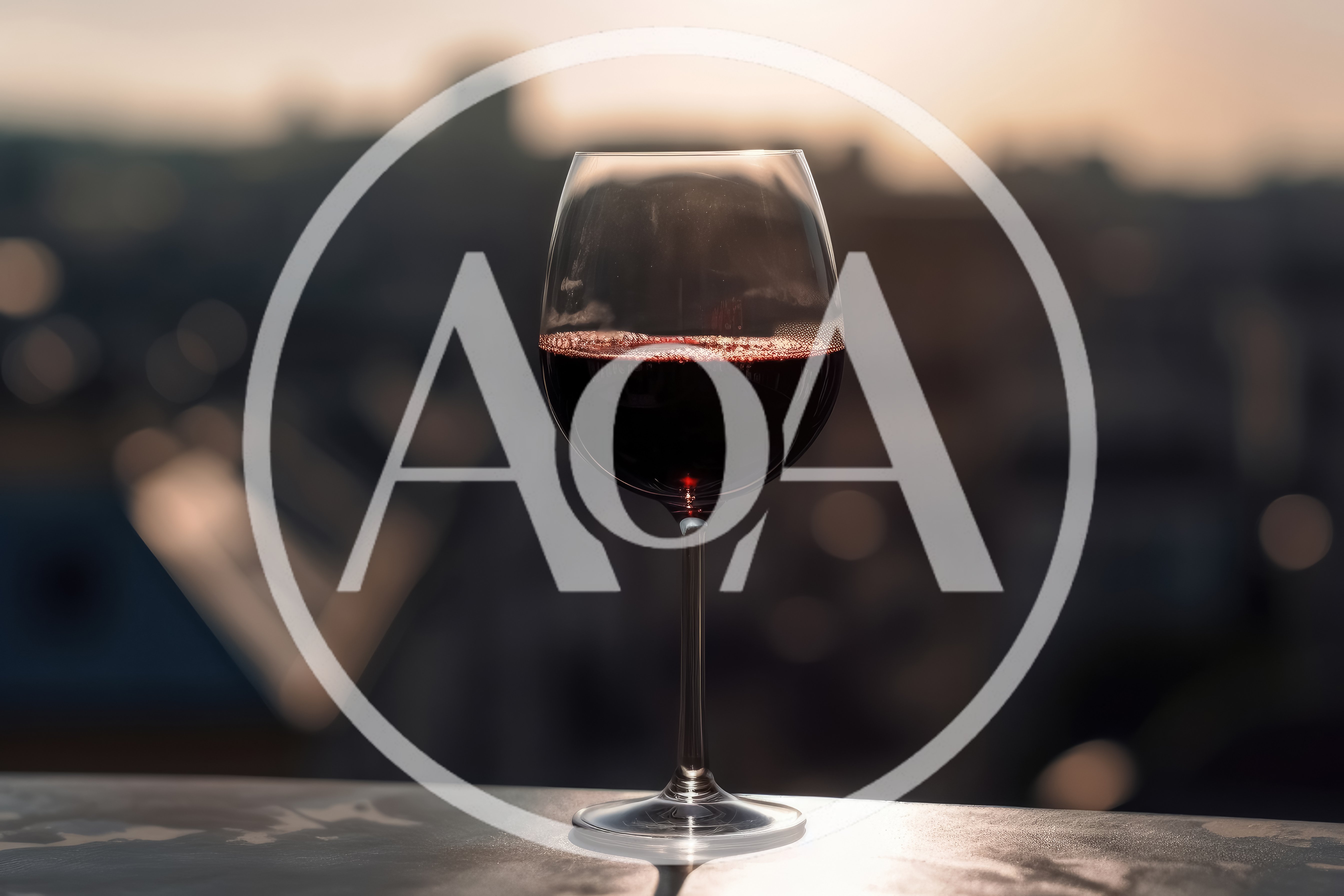 Glass Of Red Wine At Sunset Overlooking City