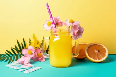 Refreshing Citrus Drink With Flowers And Fruit