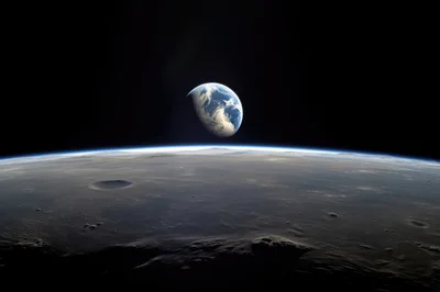 Earth Rising Over The Lunar Surface