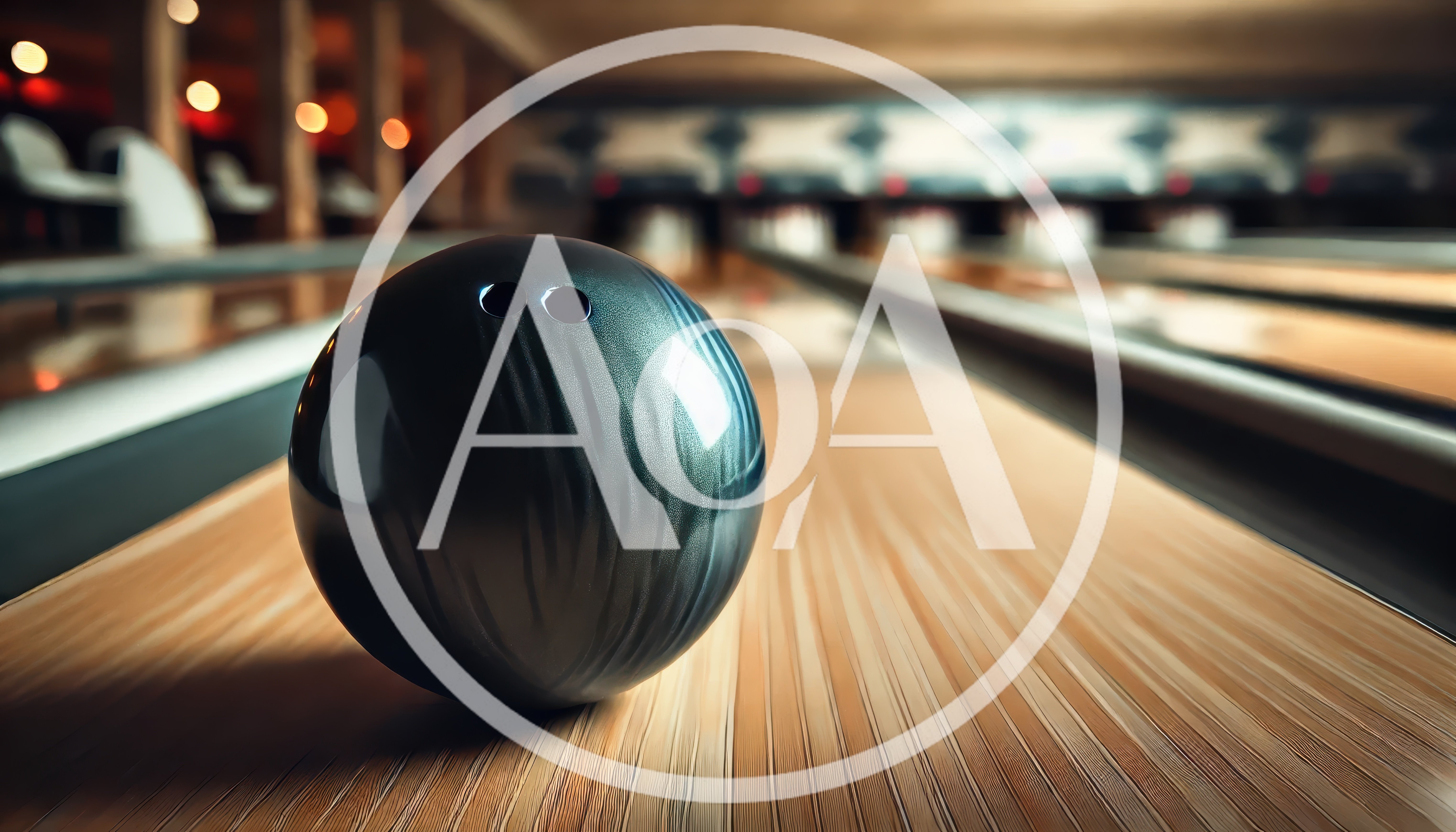Bowling Ball Resting On A Polished Wooden Lane